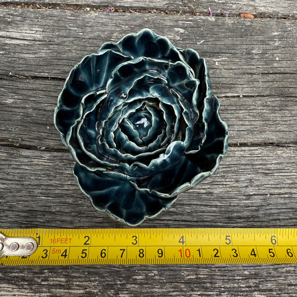Dark blue ceramic wall flower