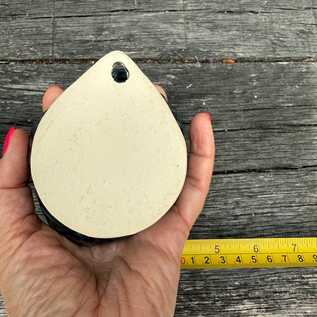 Dark blue ceramic wall flower