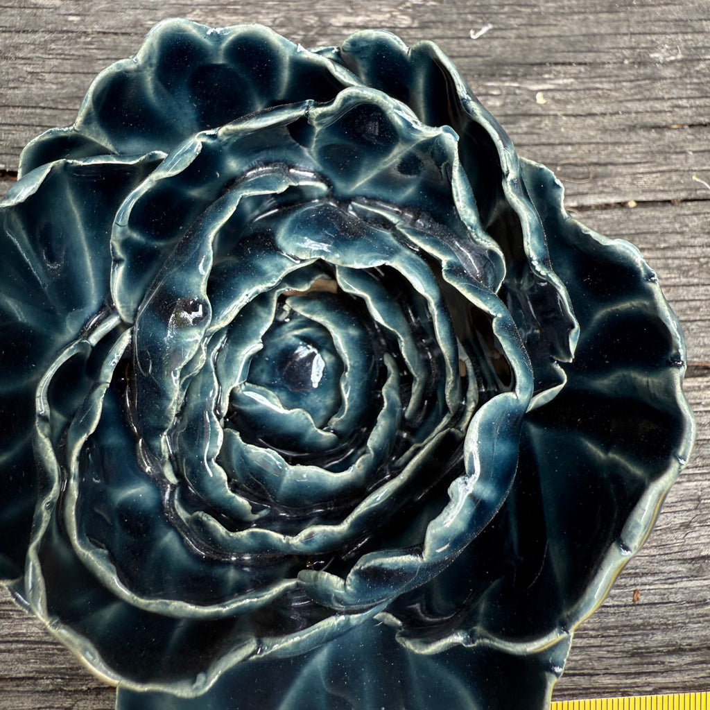 Dark blue ceramic wall flower