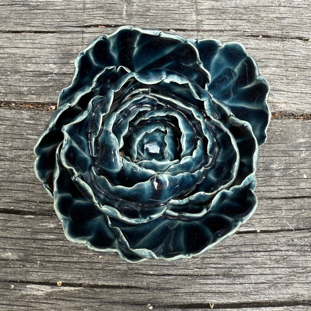 Dark blue ceramic wall flower