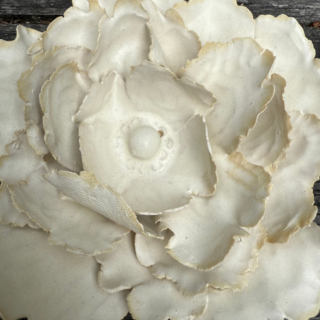 Matt white ceramic wall flower