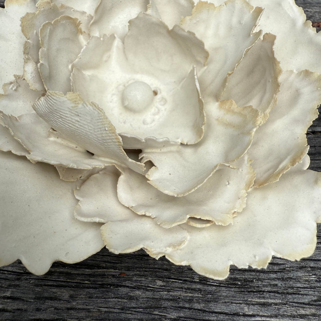 Matt white ceramic wall flower