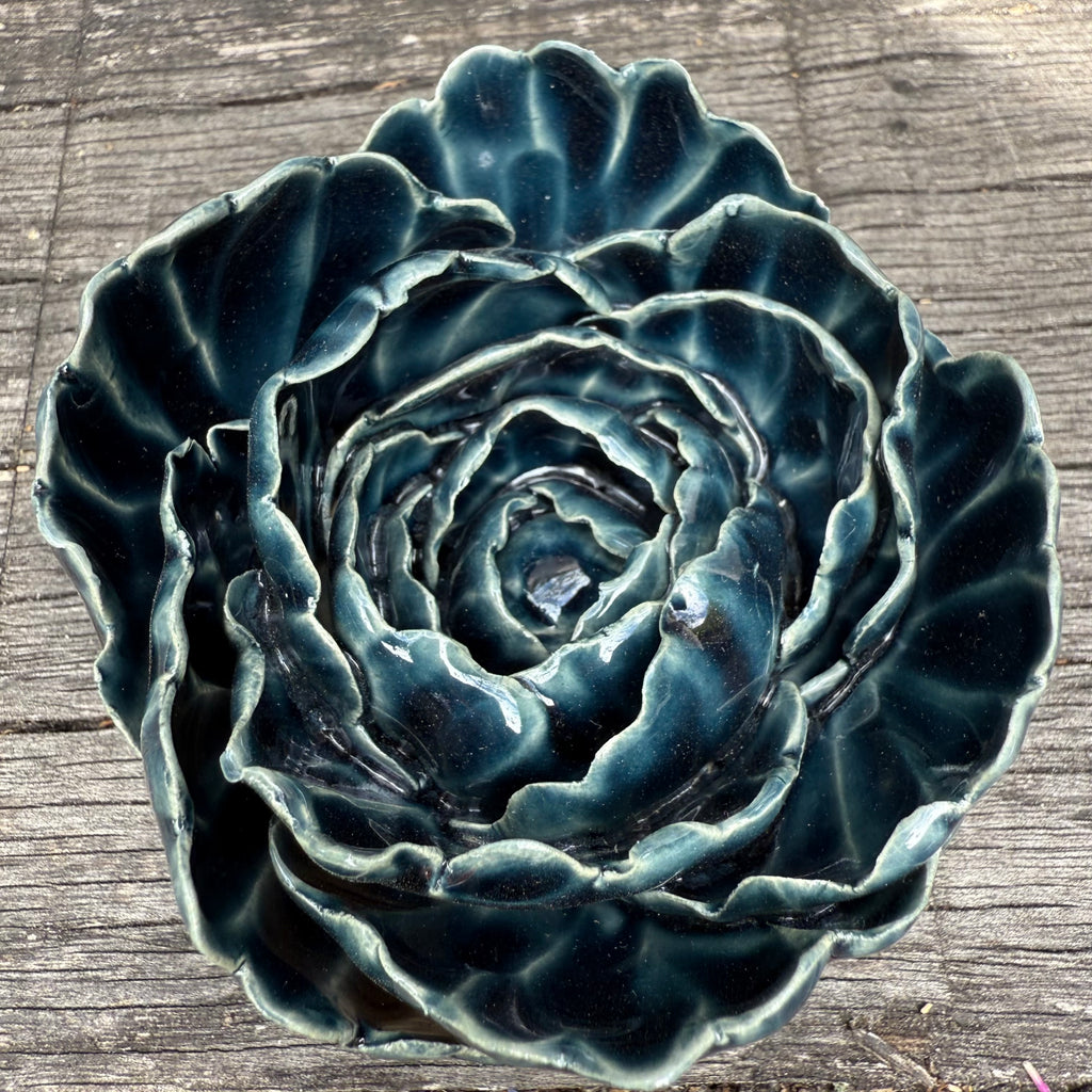 Dark blue ceramic wall flower
