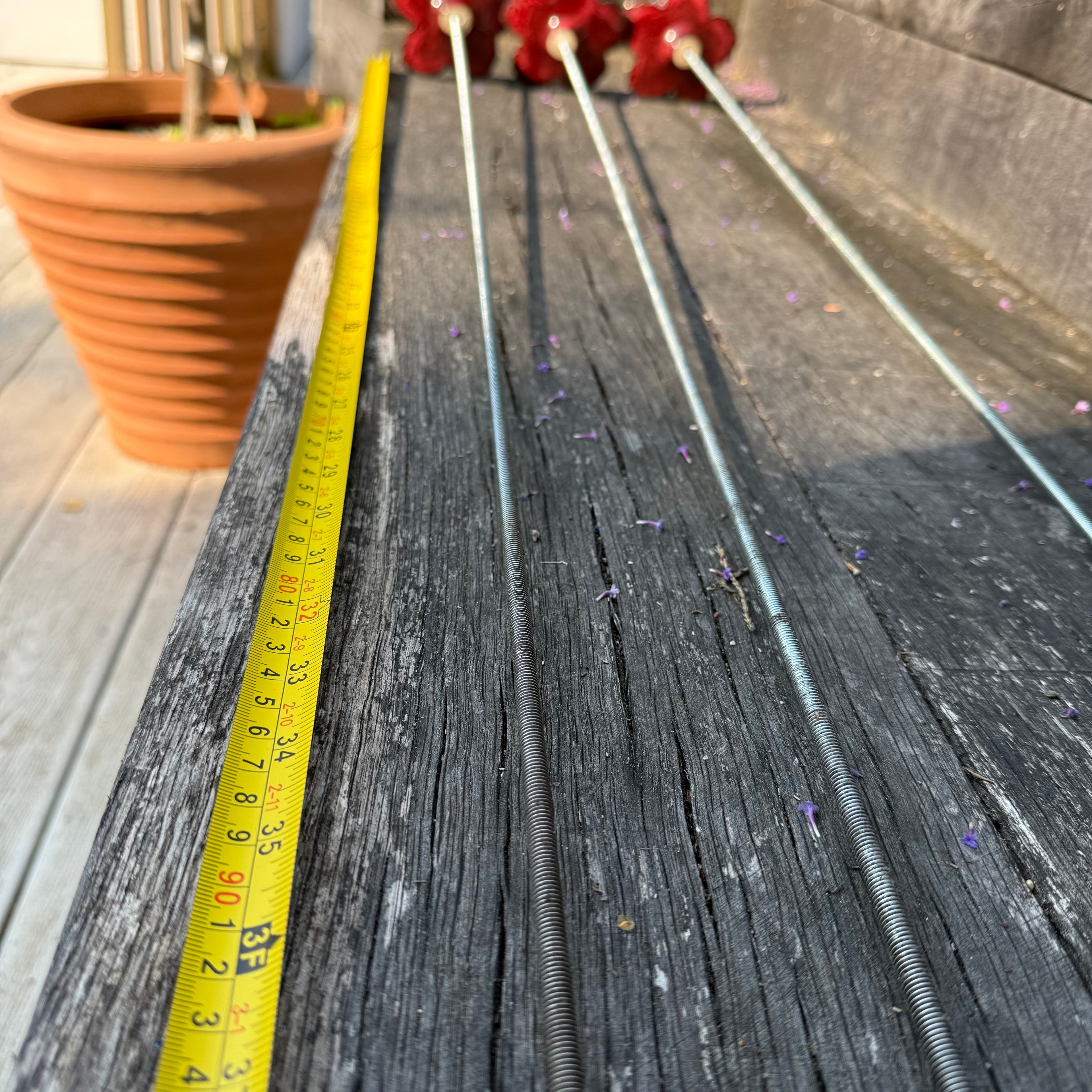 Red poppy garden ceramic flowers on tall metal stems