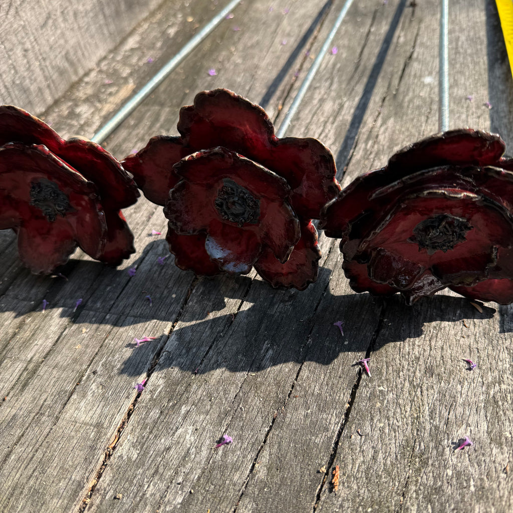 Red poppy garden ceramic flowers on tall metal stems