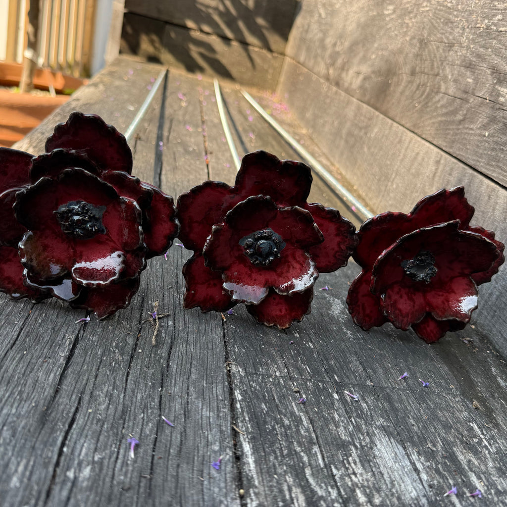 Red poppy garden ceramic flowers on tall metal stems