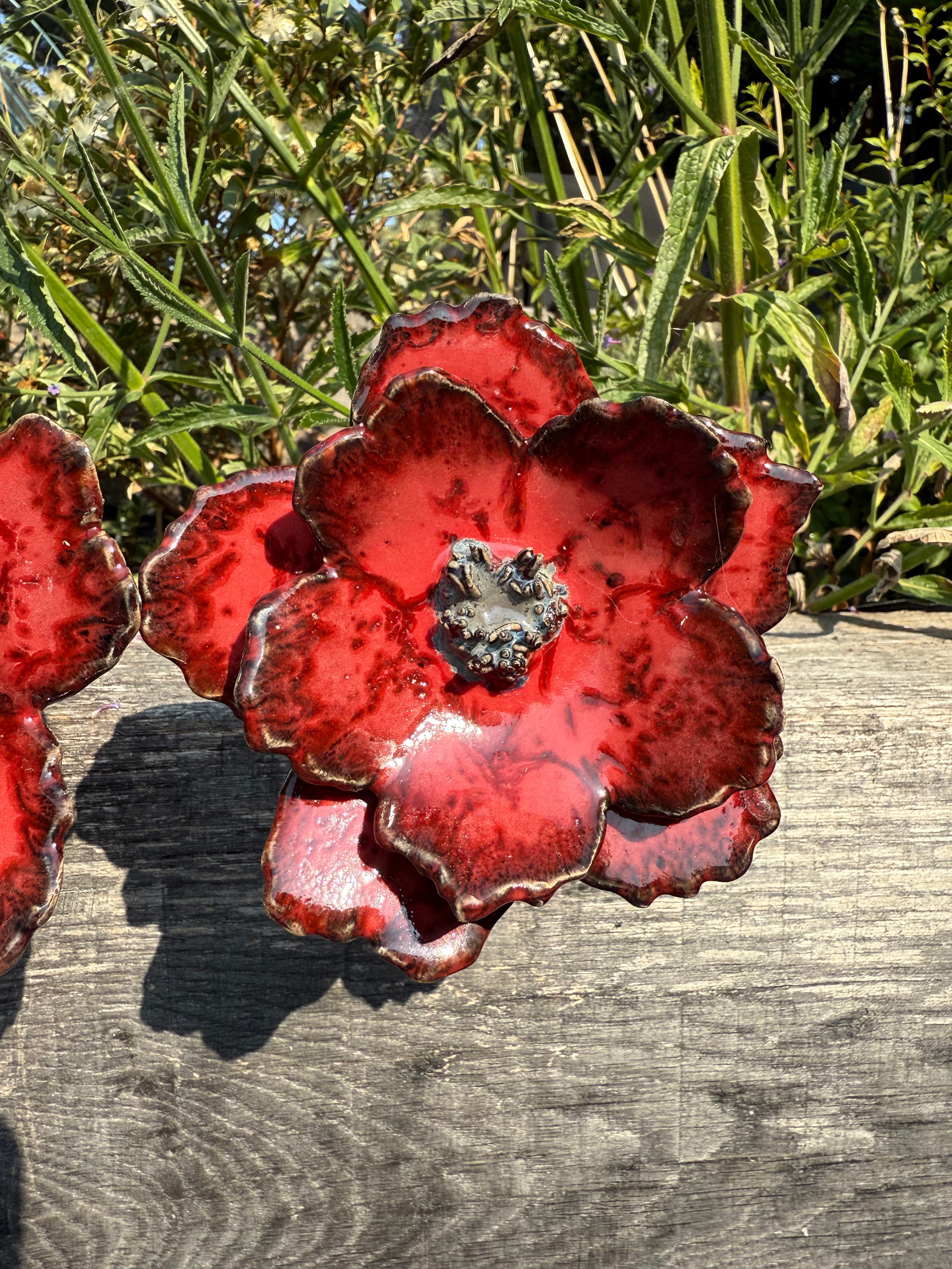 Red poppy garden ceramic flowers on tall metal stems