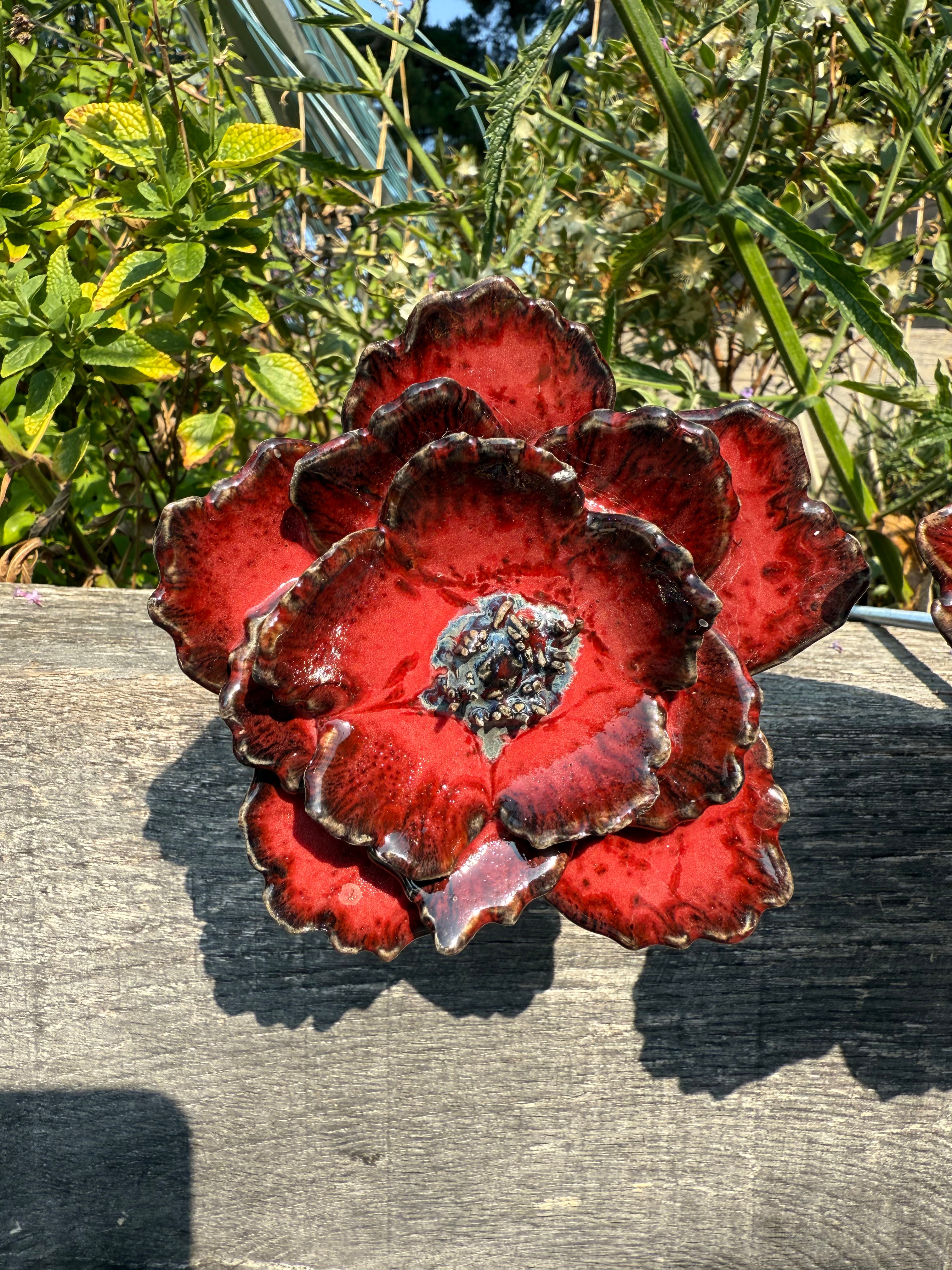 Red poppy garden ceramic flowers on tall metal stems