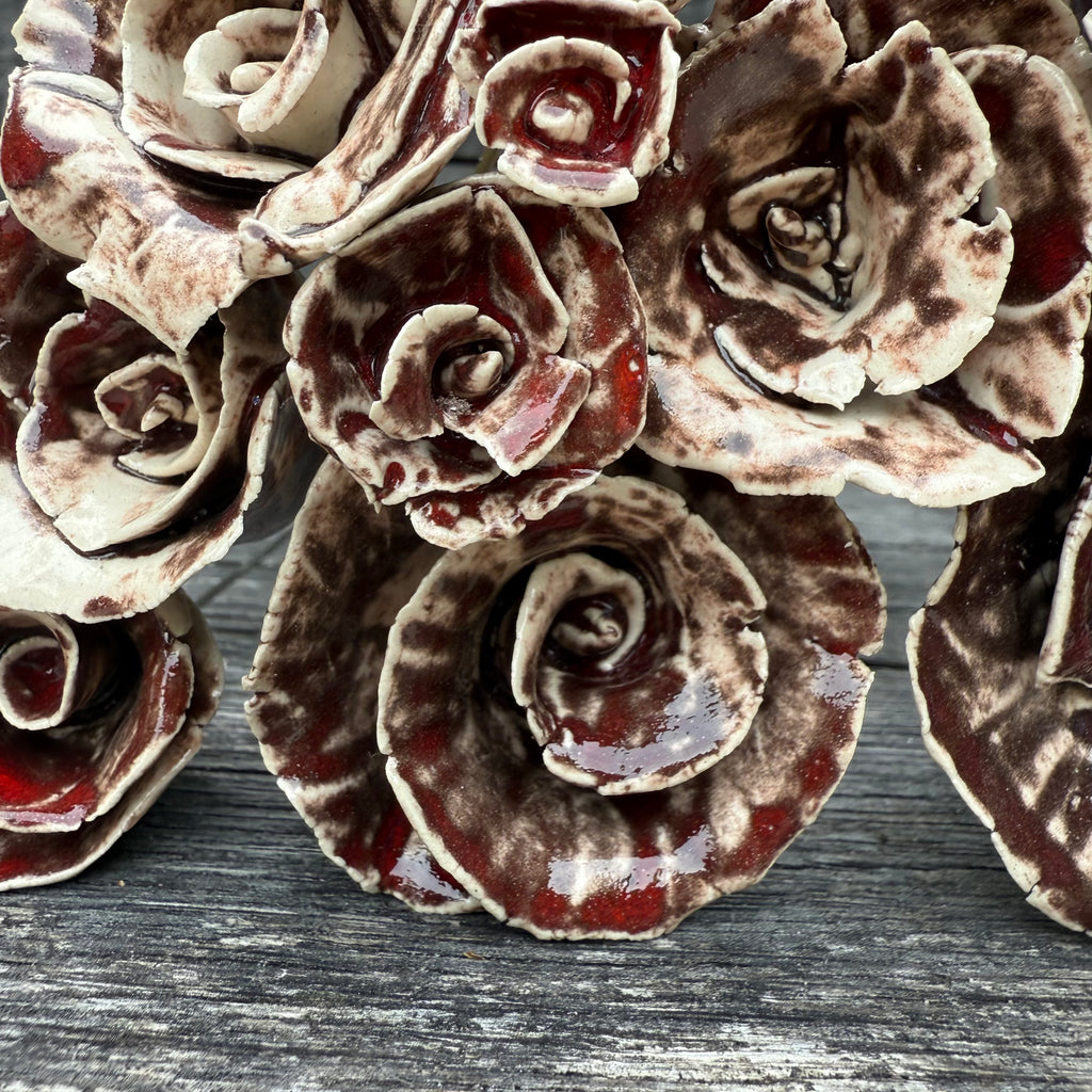 A whole bouquet of 21 rustic reds ceramic roses - each on metal stem