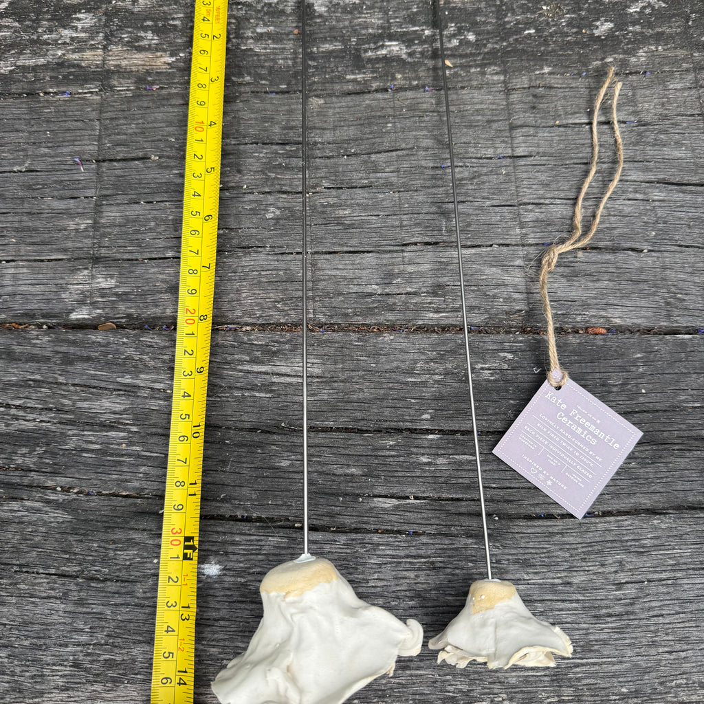 Handmade set of 2 ceramic matt white roses (each on a metal stem)